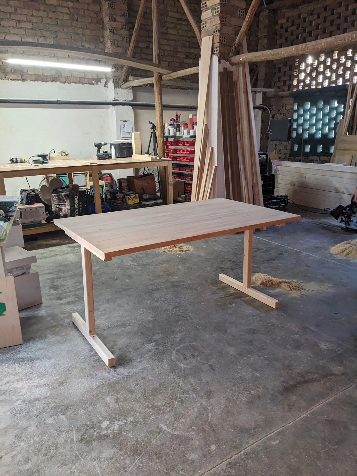 Completed timber table in the carpentry workshop