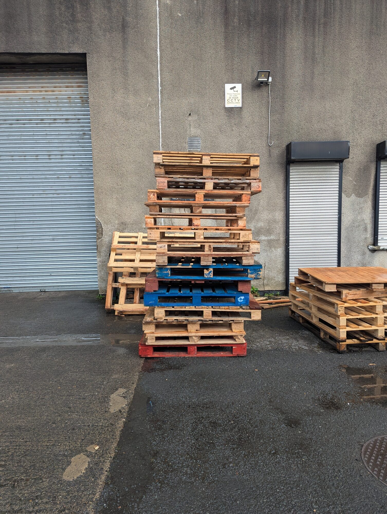 Stacked pallets at the industrial estate where materials were found